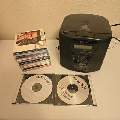 Sony mega bass personal cd player / radio / alarm clock with a variety of music on CD