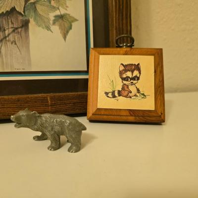 Framed bear cub wall art with assortment of rock artwork, a pewter bear, and other "nature like" decorations
