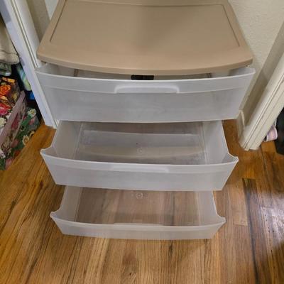Two, three drawer plastic storage units