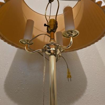 Brass floor lamp holds 4 bulbs for ultimate lighting!
