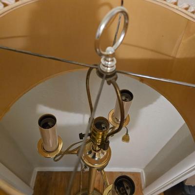 Brass floor lamp holds 4 bulbs for ultimate lighting!