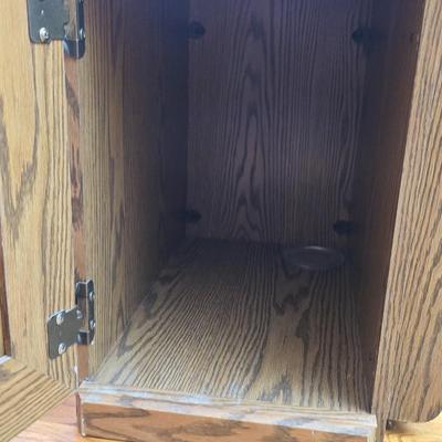 Magazine rack end table with brand new Jensen digital alarm clock and a scented candle