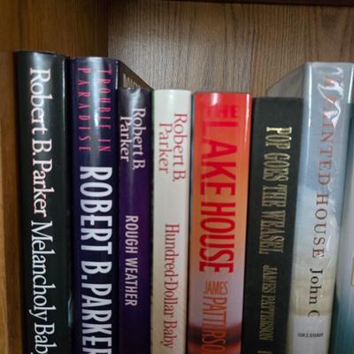 Variety of hardback books - John Grisham - James Patterson - Robert Parker