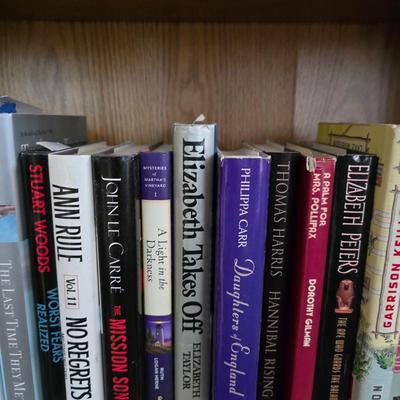 Large variety of hardback books - many great authors! 2 shelves of hardbacks!