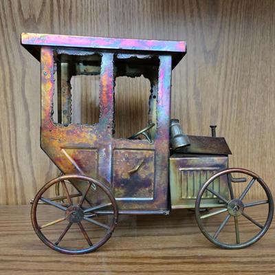Vintage copper model T music box with movement in the hood plays Tijuana Taxi and a neat wooden sailboat