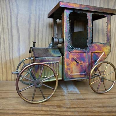 Vintage copper model T music box with movement in the hood plays Tijuana Taxi and a neat wooden sailboat