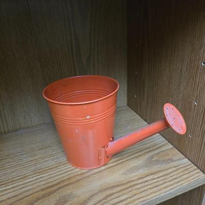 Kitchen herbs grow kit, garden sttake, mom wow planter and a small metal watering can planter
