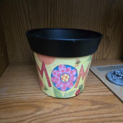 Kitchen herbs grow kit, garden sttake, mom wow planter and a small metal watering can planter