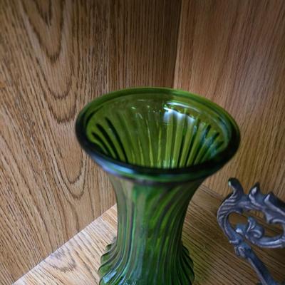 Large decorative pot metal bowl with candle and a green vase