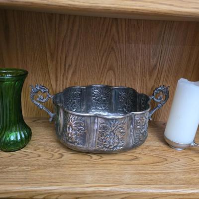 Large decorative pot metal bowl with candle and a green vase