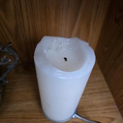 Large decorative pot metal bowl with candle and a green vase