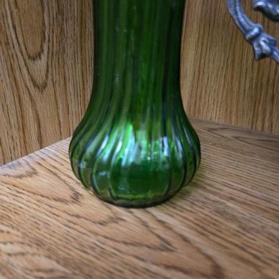 Large decorative pot metal bowl with candle and a green vase