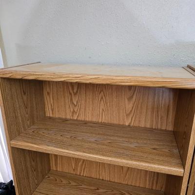 Tall bookshelf with adjustable shelves