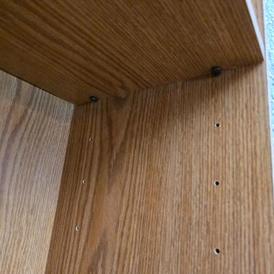 Tall bookshelf with adjustable shelves