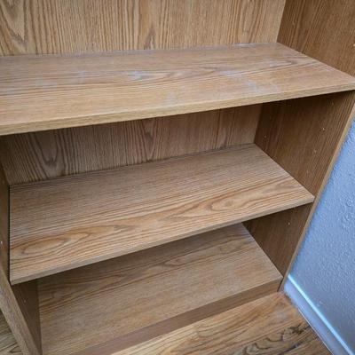 Tall bookshelf with adjustable shelves