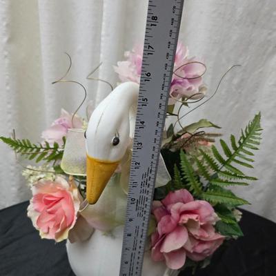 Faux flower bouquets one in glass vase, one in large blow mold Swan and tulip wall art