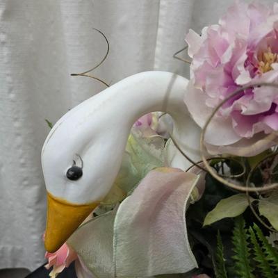 Faux flower bouquets one in glass vase, one in large blow mold Swan and tulip wall art
