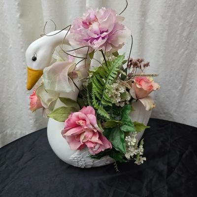 Faux flower bouquets one in glass vase, one in large blow mold Swan and tulip wall art