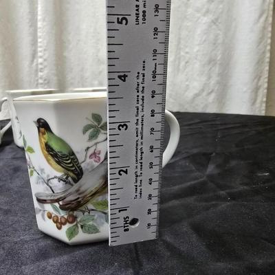 Birdhouse themed metal tea pot with four bird themed mugs - a metal tea pot trivet and a tea strainer