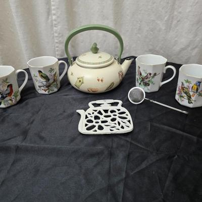 Birdhouse themed metal tea pot with four bird themed mugs - a metal tea pot trivet and a tea strainer