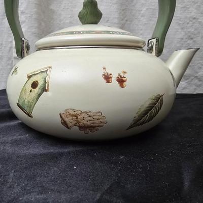 Birdhouse themed metal tea pot with four bird themed mugs - a metal tea pot trivet and a tea strainer
