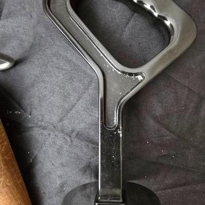 Vintage wearever aluminum strainer with stand and a Boyertown meat grinder with grinding discs