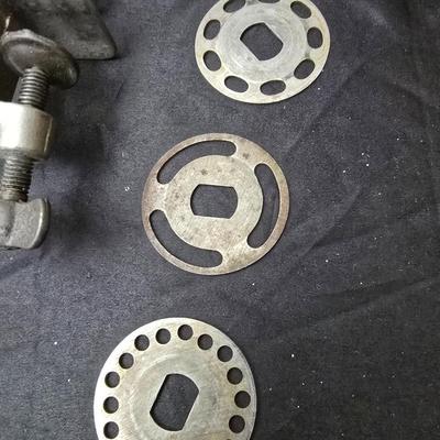 Vintage wearever aluminum strainer with stand and a Boyertown meat grinder with grinding discs