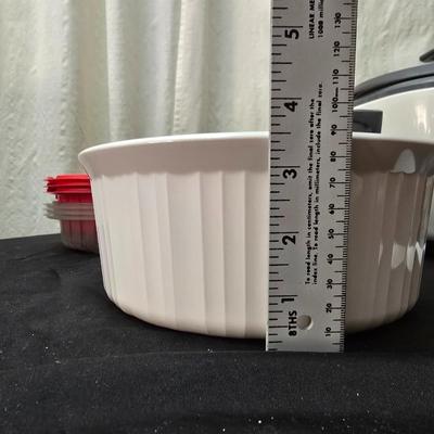 Like new rice cooker with large corning ware dish and some plastic storage containers
