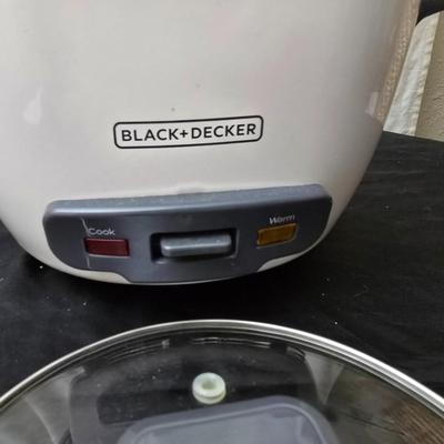 Like new rice cooker with large corning ware dish and some plastic storage containers
