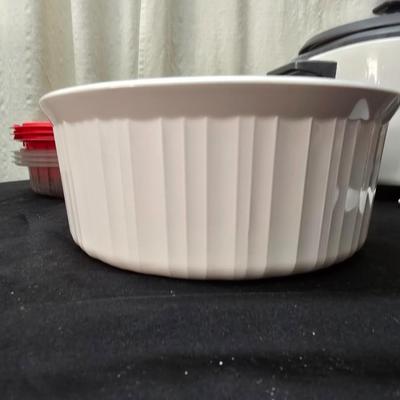 Like new rice cooker with large corning ware dish and some plastic storage containers