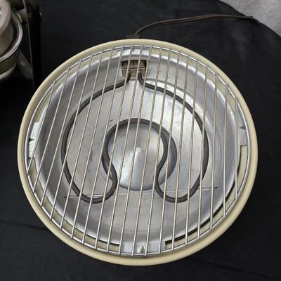 Farberware open hearth electric broiler / grill with rotisserie and a round electric grill