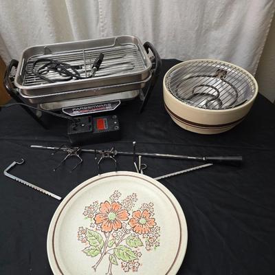 Farberware open hearth electric broiler / grill with rotisserie and a round electric grill