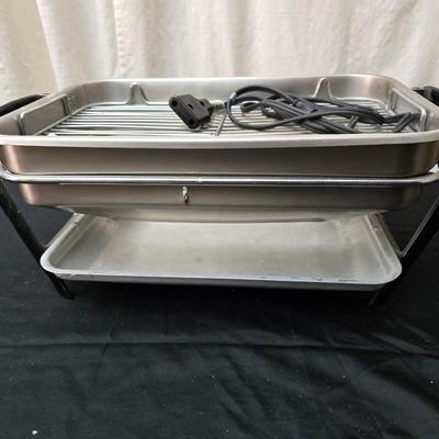 Farberware open hearth electric broiler / grill with rotisserie and a round electric grill