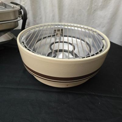 Farberware open hearth electric broiler / grill with rotisserie and a round electric grill