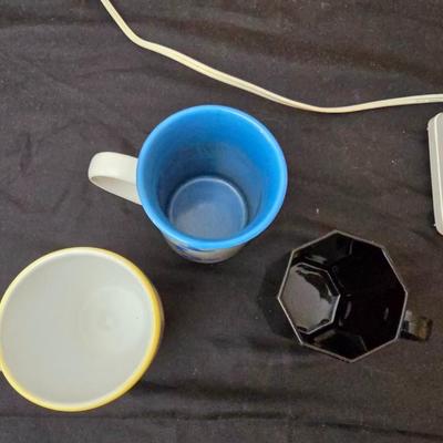 Perfect kitchen accessories for the camper! small coffee pot, cast iron frying pan, water thermos, egg organization and more