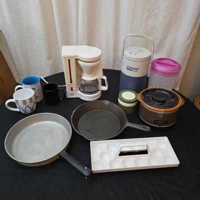 Perfect kitchen accessories for the camper! small coffee pot, cast iron frying pan, water thermos, egg organization and more