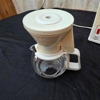 Perfect kitchen accessories for the camper! small coffee pot, cast iron frying pan, water thermos, egg organization and more