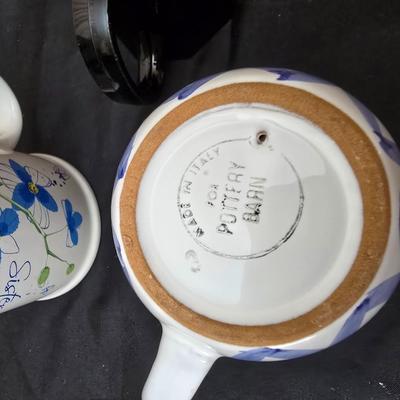 Perfect kitchen accessories for the camper! small coffee pot, cast iron frying pan, water thermos, egg organization and more