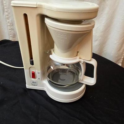 Perfect kitchen accessories for the camper! small coffee pot, cast iron frying pan, water thermos, egg organization and more
