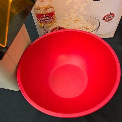 The ultimate movie set-up = Popcorn maker with popcorn bowl and condiment shakers with a toothpick container too!