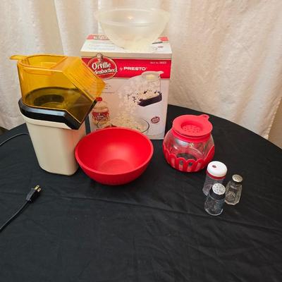 The ultimate movie set-up = Popcorn maker with popcorn bowl and condiment shakers with a toothpick container too!