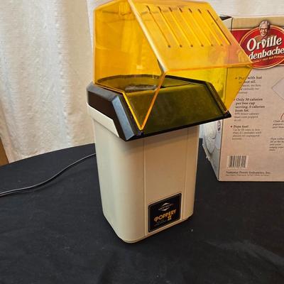 The ultimate movie set-up = Popcorn maker with popcorn bowl and condiment shakers with a toothpick container too!