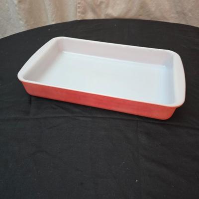 Large yellow pyrex mixing bowl with pink Pyrex cake dish