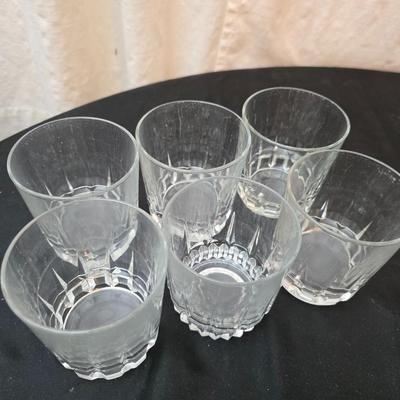 Set of 6 juice glasses - ice cube trays - glass water pitcher and two plastic Rubbermaid pitchers