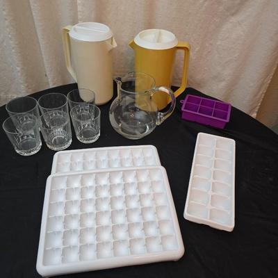 Set of 6 juice glasses - ice cube trays - glass water pitcher and two plastic Rubbermaid pitchers