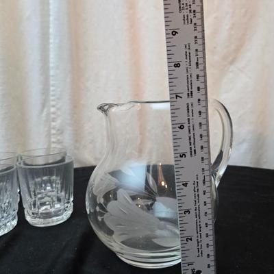 Set of 6 juice glasses - ice cube trays - glass water pitcher and two plastic Rubbermaid pitchers