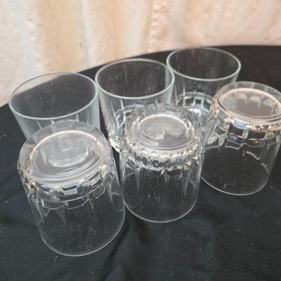 Set of 6 juice glasses - ice cube trays - glass water pitcher and two plastic Rubbermaid pitchers