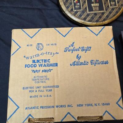 Vintage metal kitchen canister set with wall art and a electric warm - o - tray food warmer