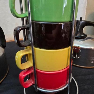 Let's have some fall tea! Two reverwear tea kettles with sets of mugs and some Carmel apple tea to share