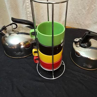 Let's have some fall tea! Two reverwear tea kettles with sets of mugs and some Carmel apple tea to share